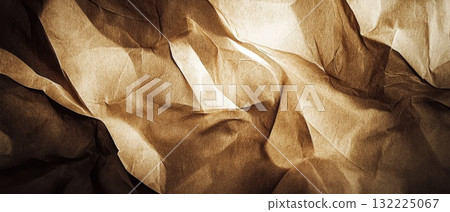Close-Up of Textured, Wrinkled Paper with Warm Sepia Hue and Intricate Shadows, the Beauty of Natural Imperfections and Light Play 132225067