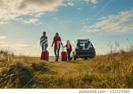 Family Walking Towards a Parked Car in an Open Field on a Bright Day with Luggage, Capturing the Essence of Adventure and Togetherness Family Walking Towards a Parked Car in an Open Field on a Bright Day with Luggage, Capturing the Essence of Adventure and Togetherness 132225085