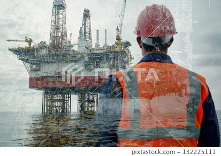 Industrial worker observing an offshore oil rig against a backdrop of digital patterns symbolizing technology and innovation in energy production 132225111