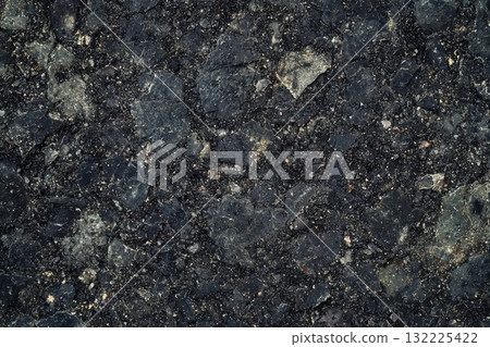 High-Resolution Image of Dark Asphalt Texture Featuring Varied Fragments and Natural Stone Patterns for Urban and Industrial Design Applications 132225422