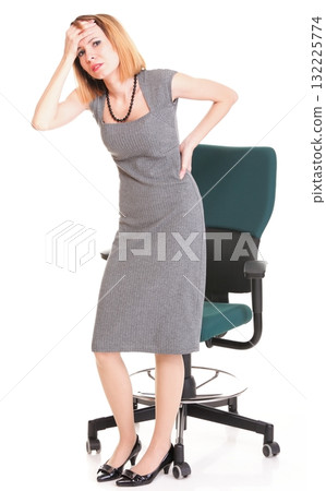 Business woman with back pain after long work on chair Isolated Business woman with back pain after long work on chair Isolated 132225774