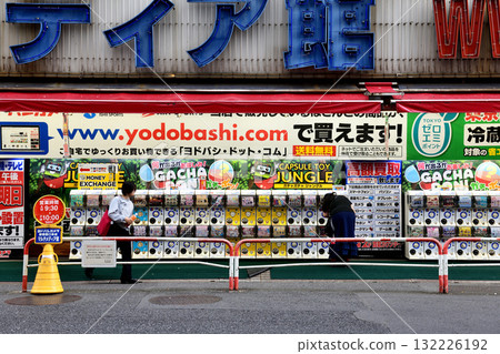 Gashapon machines lined up in front of a camera shop at Shinjuku West Exit Gashapon machines lined up in front of a camera shop at Shinjuku West Exit 132226192