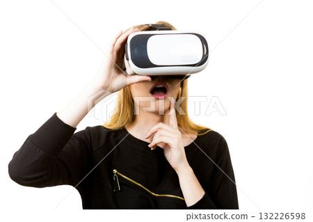 Woman wearing VR goggles Woman wearing VR goggles 132226598
