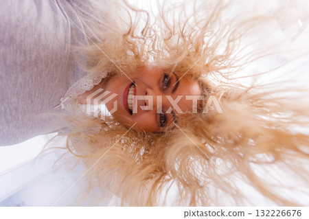 Woman with wet blonde hair Woman with wet blonde hair 132226676