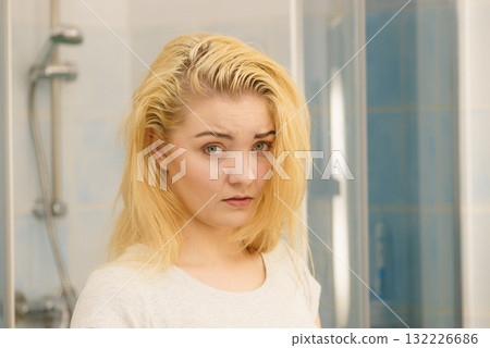 Female having problem with blonde hair Female having problem with blonde hair 132226686
