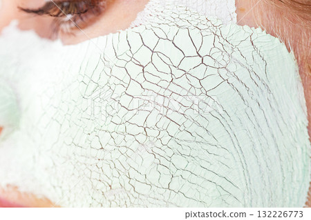 Girl with mud mask on face Girl with mud mask on face 132226773