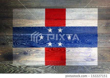 Netherlands Antilles flag on rustic old wood surface background Netherlands Antilles flag on rustic old wood surface background 132227151