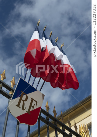 French flags waving proudly at the Prefecture in France under a bright sky French flags waving proudly at the Prefecture in France under a bright sky 132227318