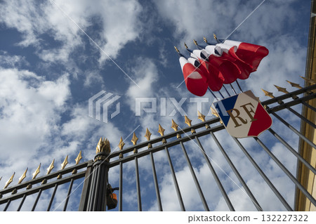 French flags waving proudly at the Prefecture in France under a bright sky French flags waving proudly at the Prefecture in France under a bright sky 132227322