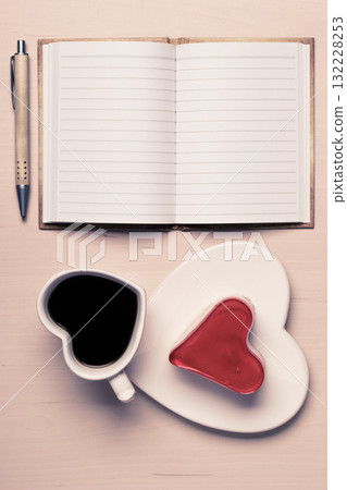 coffee cup cake in heart form and notebook coffee cup cake in heart form and notebook 132228253
