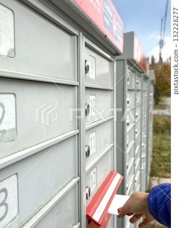Mailing a Letter in a Canadian Neighborhood 132228277
