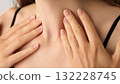 Close-up of an unrecognizable woman touching her neck. Endocrine health prevention, treatment. Diseases of the thyroid gland. Cancer screening. Endocrinology. Medical concept, Healthcare, Self-care. 132228745