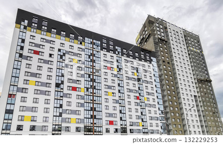 Modern residential buildings with colorful facades and contemporary architectural design elements 132229253