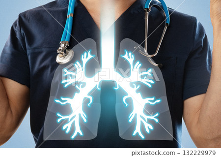 Medical professional demonstrating respiratory anatomy with lungs graphic representation 132229979