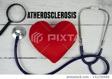 Atherosclerosis text with Red heart, Magnifying glass and Medical Stethoscope on wooden background Atherosclerosis text with Red heart, Magnifying glass and Medical Stethoscope on wooden background 132230488