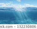 Ocean waters gleam under clear sky, with light rays illuminating sandy floor. Ideal for nature and aquatic projects. 132230806