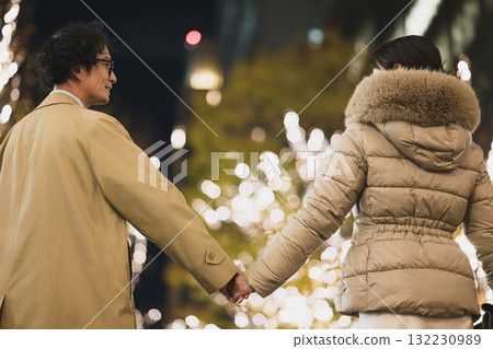 A couple connecting hands 132230989