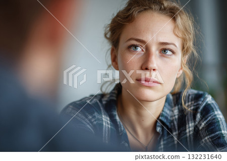 Patient listening psychologist during mental health session 132231640