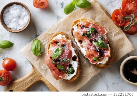Delicious Bread Topped With Prosciutto and Basil During a Leisurely Afternoon Delicious Bread Topped With Prosciutto and Basil During a Leisurely Afternoon 132231705