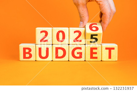2026 Budget symbol. Concept words 2026 Budget on beautiful wooden blocks. Beautiful orange paper background. Businessman's hand. Business and 2026 budget concept. Copy space. 2026 Budget symbol. Concept words 2026 Budget on beautiful wooden blocks. Beautiful orange paper background. Businessman's hand. Business and 2026 budget concept. Copy space. 132231937