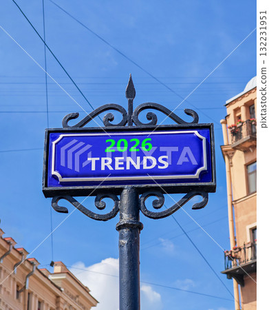 2026 Trends new year symbol. Concept words 2026 Trends on beautiful blue road sign. Beautiful blue sky and buildings background. Business and 2026 Trends new year concept. Copy space. 132231951