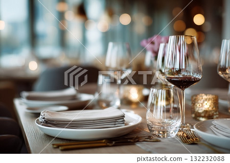 Elegant Dining Setup With Glasses and Tableware at a Modern Restaurant During Evening 132232088