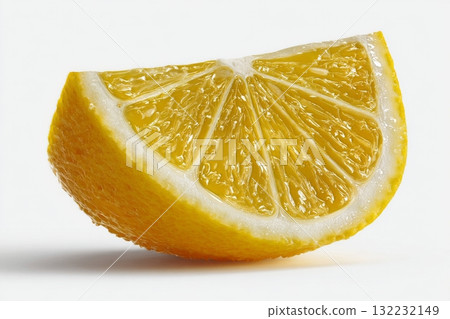 Bright Lemon Wedge Resting on White Background Showcasing Its Juicy Texture and Vibrant Color 132232149