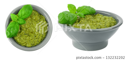 Pesto sauce in ceramic bowl isolated on white background. Top view. Flat lay. Pesto sauce in ceramic bowl isolated on white background. Top view. Flat lay. 132232202