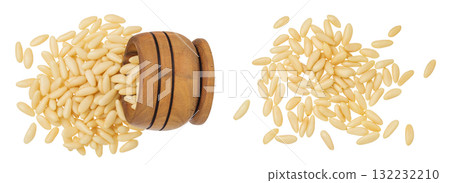 Shelled European pine nuts in wooden bowl isolated on white background with full depth of field. Top view. Flat lay 132232210
