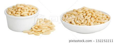 Shelled European pine nuts in ceramic bowl isolated on white background with full depth of field Shelled European pine nuts in ceramic bowl isolated on white background with full depth of field 132232211