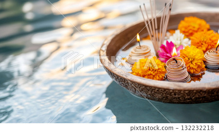 Loy Krathong festival with floating flowers and incense on water, background 132232218