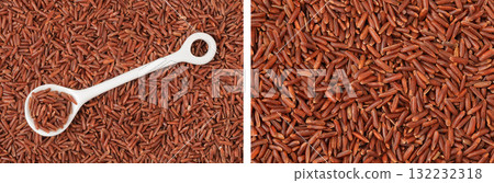 red rice in a ceramic spoon as a background. Top view. Flat lay 132232318