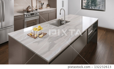 A kitchen counter with a bowl of lemons and a tea kettle on it A kitchen counter with a bowl of lemons and a tea kettle on it 132232613