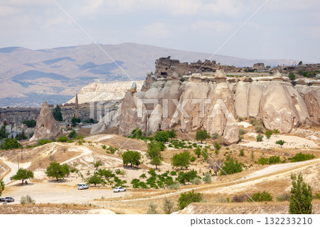 Volcanic rock formations landscape in Cappadocia, place of residence of ancient Christians Volcanic rock formations landscape in Cappadocia, place of residence of ancient Christians 132233210