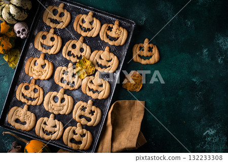 Halloween cookies in shape of jack-o-lantern Halloween cookies in shape of jack-o-lantern 132233308