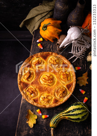 Halloween apple pie with scary faces 132233313