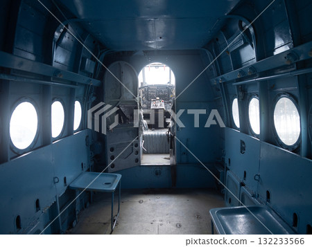 empty aircraft interior, stripped cabin with retro atmosphere, vintage airplane cabin with stripped seats and mood lighting, inside abandoned aircraft with retro style and salvaged lighting empty aircraft interior, stripped cabin with retro atmosphere, vintage airplane cabin with stripped seats and mood lighting, inside abandoned aircraft with retro style and salvaged lighting 132233566