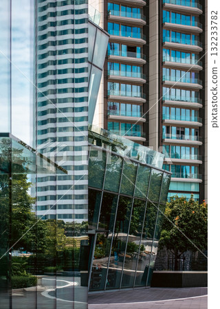 mirrored windows and sleek facade of modern building with reflective glass, glossy panels and elegant exterior of contemporary skyscraper with urban charm mirrored windows and sleek facade of modern building with reflective glass, glossy panels and elegant exterior of contemporary skyscraper with urban charm 132233782