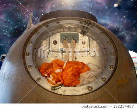 scene depicts capsule interior after landing, interior view of capsule for postlanding recovery procedures, inspection scene showing capsule interior following landing for recovery 132234497
