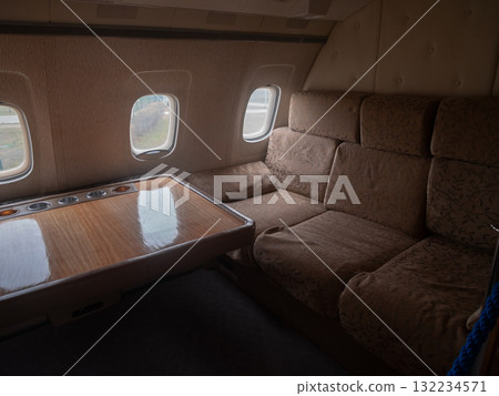 luxury jet interior, elegant private jet with plush seats, opulent aircraft cabin featuring wood accents and soft sofas, lavish jet interior with elegant furnishings and cozy seating areas luxury jet interior, elegant private jet with plush seats, opulent aircraft cabin featuring wood accents and soft sofas, lavish jet interior with elegant furnishings and cozy seating areas 132234571