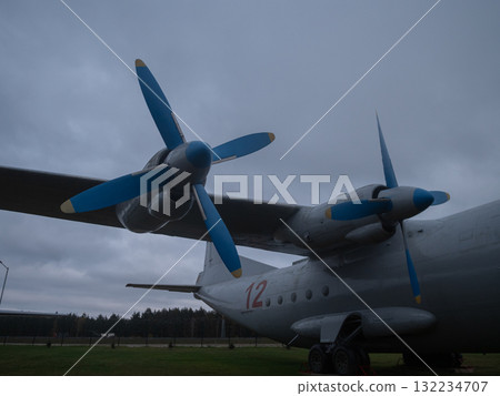 vintage aircraft exhibit, historical transport aircraft with twin blue propellers showcased outdoors, vintage twinengine aircraft with faded registration numbers exhibited at outdoor vintage aircraft exhibit, historical transport aircraft with twin blue propellers showcased outdoors, vintage twinengine aircraft with faded registration numbers exhibited at outdoor 132234707