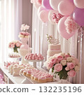 Birthday table decoration with sweets, flowers, candles and pink balloons. 132235196