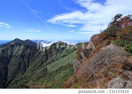 Mount Ishizuchi, looking towards Ninomori from Mount Misen (Ehime Prefecture, one of Japan's 100 famous mountains) Mount Ishizuchi, looking towards Ninomori from Mount Misen (Ehime Prefecture, one of Japan's 100 famous mountains) 132235828