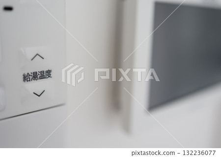 Hot water temperature adjustment button. Part of the remote control. 132236077