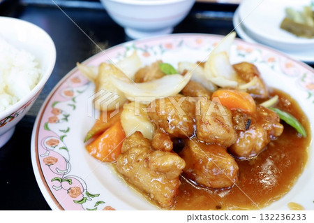 A close-up of sweet and sour pork, a classic Chinese side dish. 132236233