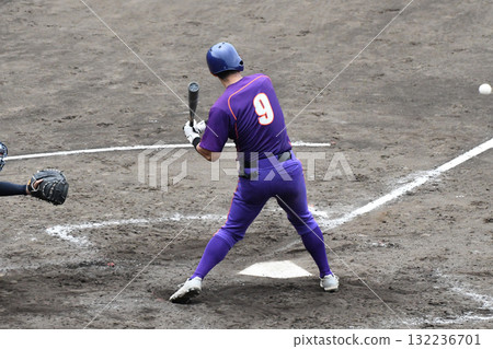 Batter hitting the ball 132236701