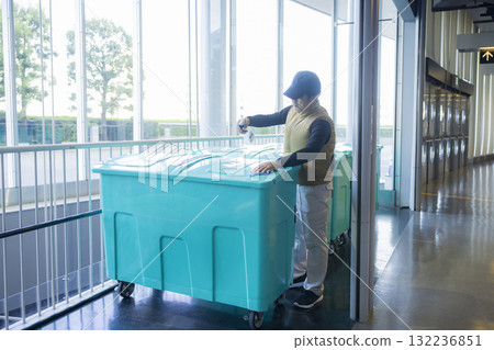 A man who throws away garbage A man who throws away garbage 132236851