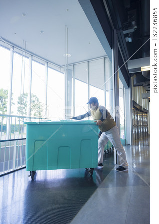 A man who throws away garbage A man who throws away garbage 132236855