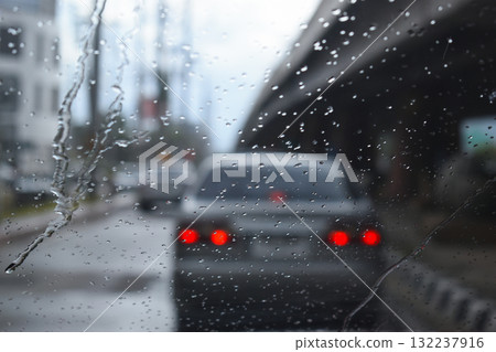 car on highway road with rainny season, blurred image 132237916