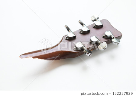 part of broken wood acoustic guitar isolated on white background 132237929